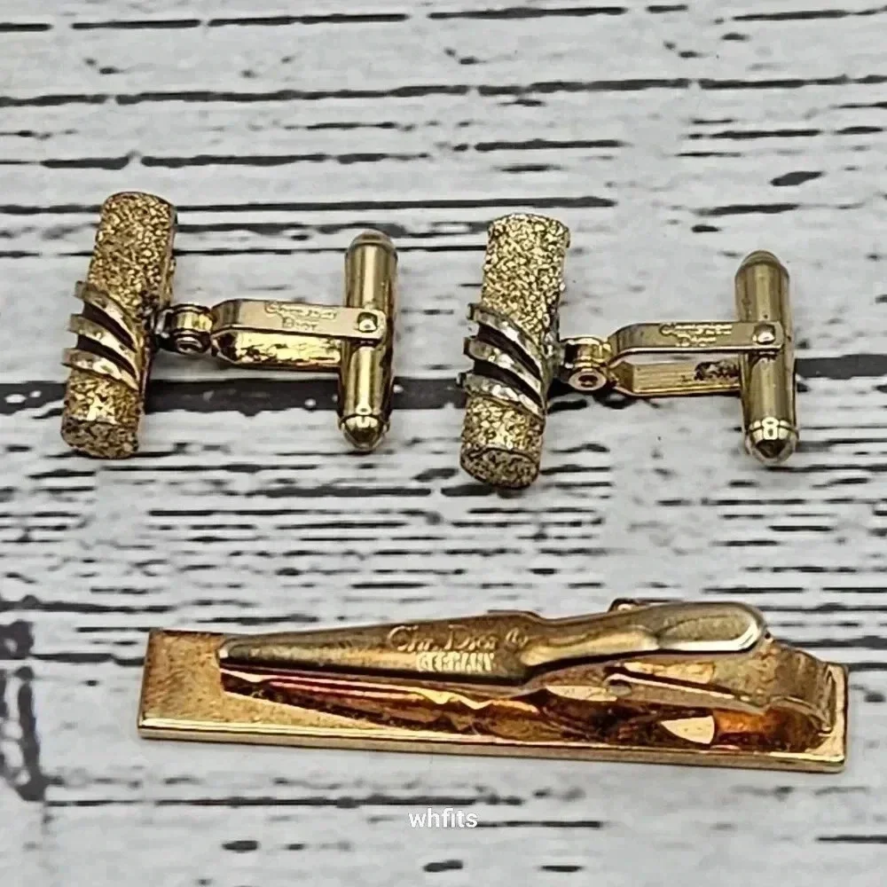 Christian Dior Gold Tone Cufflinks and Tie Bar Set